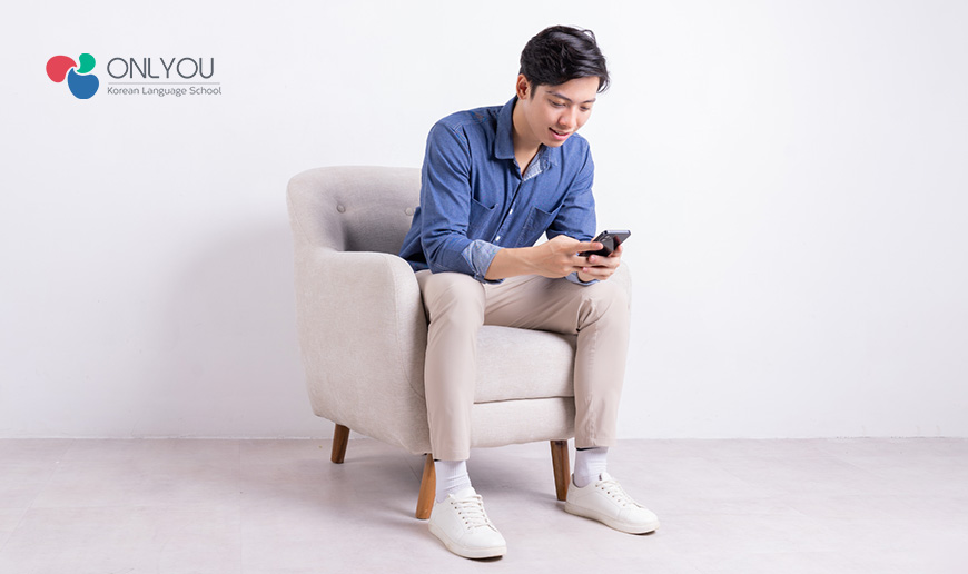 A person sitting with legs on the ground